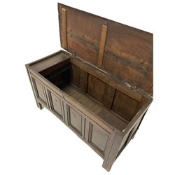 18th century panelled oak blanket chest, the hinged lifting lid opening to reveal storage space over panelled base with 'TL' inscription, raised on stile supports 