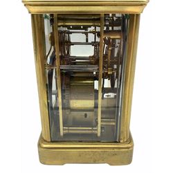 Early 20th century twin train Corniche cased striking carriage clock with repeat, striking the hours on a coiled gong, eight-day movement with a replacement jewelled lever platform escapement,  silvered balance with timing screws,white enamel dial with Roman numerals, minute markers and steel moon hands, bevelled glass panels to case and a rectangular glass panel to the top of the case. 