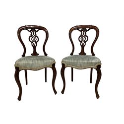 Pair 19th century mahogany dining chairs, pierced splat back carved with scrolls, upholstered seat raised on cabriole supports