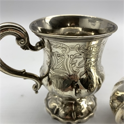 William IV silver mustard pot of lobed circular design with bud lift and leaf capped handle London 1831 Makers mark W E (liner replaced) and a Victorian engraved  silver christening cup with scroll handle and vacant cartouche London 1841 Maker Joseph and Albert Savory 11.5oz 