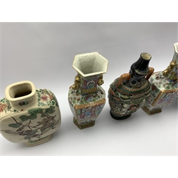 Pair of 19th century Chinese Canton Famille Rose vases of hexagonal form painted with panels of figures, H31cm together with four other pieces of Oriental pottery including a Moon Flask and two Japanese vases (mostly a/f) (5)
