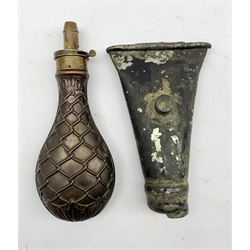 Copper powder flask with ropework decoration and a 19th century flask with a naval button 