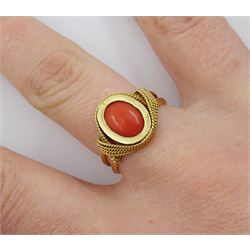 Gold single stone coral ring, in rope twist setting