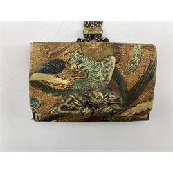 Japanese Meiji tooled leather tobacco pouch (tabako-ire) with metal mae-kanagu in the form of a Dragon and multiple adjustable chain to a faux ivory and metal kagamibuta, L13.5cm 