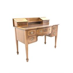 Carlton House style inlaid mahogany break bow front desk, the raised back with open shelf and two hinged trinket compartments over inset leather writing surface, fitted with four short and one long drawer, raised on square tapered supports with peg feet W122cm, H99cm, D60cm