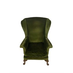 Parker Knoll - Pair of 20th century wingback armchairs, upholstered in green fabric, raised on oak cabriole supports 