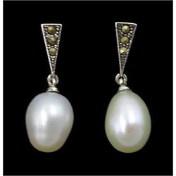 Pair of silver pearl and marcasite pendant stud earrings, stamped 925