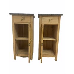Pair of pine bedside cupboards, variegated grey marble top over drawer and panelled cupboard enclosing shelf, raised on stile supports W40cm