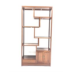 Chinese hardwood curio stand, fitted with four staggered shelves, double cupboard and drawer. W92cm, H182cm, D36cm