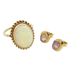 Gold oval opal ring and pair of gold oval opal earrings, both 9ct stamped or hallmarked