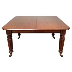 Victorian mahogany extending dining table, moulded rectangular top with rounded corners, pull-out action base on lobe reeded supports with brass cups and castors, the curved block knees with recessed moulded frame decoration, together with three additional leaves and mahogany leaf rack

Table: H77cm, 137cm x 135cm - 320cm (fully extended)
Leaf rack: W73cm, H151cm, D25cm