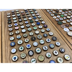  Large collection of Golf ball markers mounted on oak panels, 55cm x 23cm  