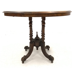 Victorian walnut small centre table, the burr top with boxwood and ebonised inlay over four turned columns, raised on four splayed leaf carved supports terminating in ceramic castors, 92cm x 46cm, H72cm