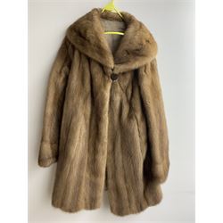 Mink half length fur coat with waist tie and paisley silk lining, together with another blonde mink half length coat