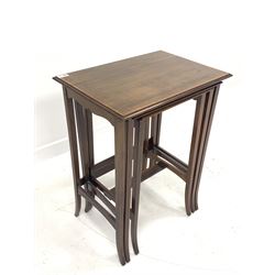 Edwardian mahogany nest of three tables with satinwood banding, raised on slender splayed supports with string inlay W54cm