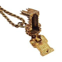 9ct gold cathedral pendant, on 9ct gold rope twist chain necklace, hallmarked