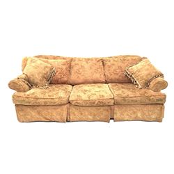 Large country house three seat sofa, upholstered in burnt orange tufted floral damask fabric, raised on turned supports (W257cm) together with a matching two seat sofa 