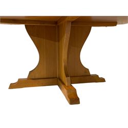 Knightman - oak dining table, shaped and extended octagonal top, cruciform base on sledge feet, by Horace Knight of Balk, Thirsk
