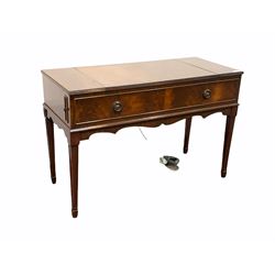 Garrard radiogram in Regency style mahogany table case, the cross banded lift up top revealing Garrard SP25 MKIV turntable and Dynatron system, flanked by integrated fold out speakers, raised on square tapered supports, 97cm x 42cm, H64cm