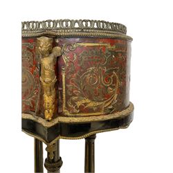 19th century ebonised and red Boulle work jardiniere or planter stand, shaped form set with raised gilt metal gallery and putti figures, on quadruple pillar base with turned central finial, splayed supports