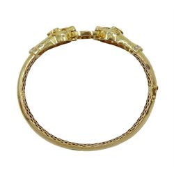 14ct gold sapphire and diamond panther hinged bangle, each head set with a pear shaped sapphire and round brilliant cut diamonds, stamped 585 14K