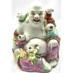 20th century Chinese porcelain figure of Hotei seated with five children, H21cm 