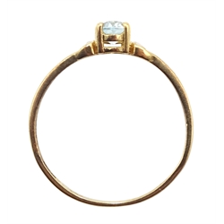 Gold single stone blue topaz ring, stamped 9ct