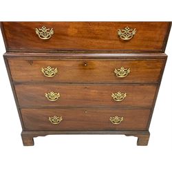 George III mahogany chest on chest, the projecting moulded and dentil cornice over plain frieze, fitted with two short and six graduating drawers with oak linings, on bracket feet