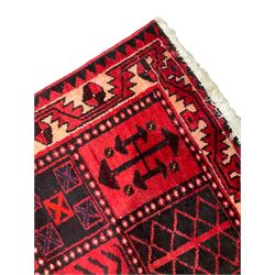 Persian Lori Bakhtiari crimson ground rug, the field decorated with a chequerboard layout of dark indigo and red panels containing stylised plant and geometric motifs