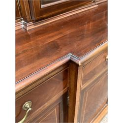 20th century Sheraton design mahogany breakfront bookcase, dentil cornice over crossbanded frieze, three astragal glazed doors each enclosing three adjustable shelves, three drawers and cupboards under, W154cm, H216cm, D65cm