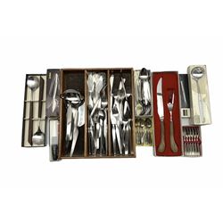 German part service of stainless steel cutlery by Grasoli to include knives and forks, fish knives and forks, spoons, carving set, cocktail set, ladle etc, together with other vintage cutlery sets including Asni Denmark Stainless steel and teak salad servers, two Hardanger Tinn serving spoons, together with other similar cutlery sets 