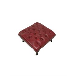 Red leather footstool, upholstered in red leather raised on cabriole supports 