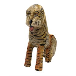 Indian carved polychrome painted model of a seated Tiger, H22cm