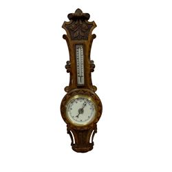 Carved oak aneroid barometer