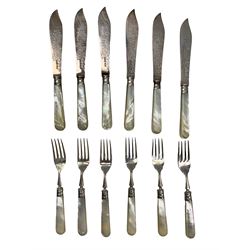 Set of six Edwardian fish knives and forks with engraved silver blades and mother of pearl handles Sheffield 1902 Maker James Dixon & Sons