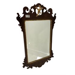 Chippendale style wall hanging mirror, mahogany fret cut frame with gilt ho-ho bird, 42cm x 72cm