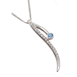 White gold blue topaz pendant stamped 18K, on white gold chain necklace hallmarked 18ct,  retailed by Jill Freeman, in original box