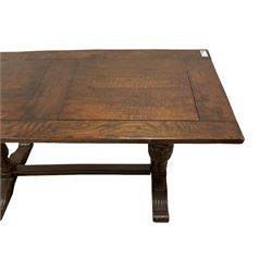 19th century oak dining table, rectangular top raised on lobe and foliate carved and turned baluster end supports, fluted sledge feet joined by stretcher