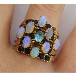 Gold opal, sapphire and blue stone five band ring