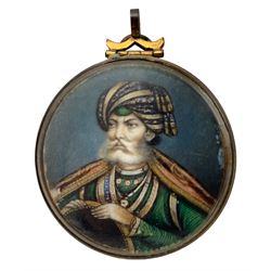 Delhi School - Mid to late 19th century circular portrait miniature, watercolour on ivory of an Indian gentleman D4cm. This item has been registered for sale under Section 10 of the APHA Ivory Act