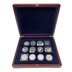 Commemorative coins and medallions including six silver gilt hallmarked medallions etc, housed in two display cases