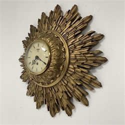 Smiths giltwood starburst wall clock, with white enamel dial and Roman numeral chapter ring, eight day single train movement, W43cm