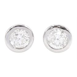 Pair of 18ct white gold bezel set round brilliant cut diamond stud earrings, total diamond weight approx 1.60 carat
