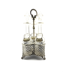 Plated three division decanter stand with loop handle, pierced sides and fitted with three glass decanters with plated labels