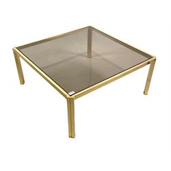 Vintage mid century coffee table, smoked glass top raised on cast brass frame and supports 86cm x 86cm, H37cm