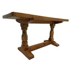 Mouseman - adzed oak rectangular coffee table, octagonal pillar supports on sledge feet joined by stretcher, carved with mouse signature, by Robert Thompson of Kilburn