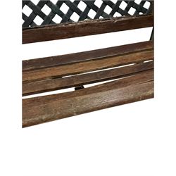Iron framed garden bench, the iron lattice back over a five plank seat W127cm