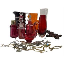 Quantity of cranberry glass including jug with stopper, decanters jugs etc together with costume jewellery