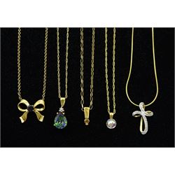 Five 9ct gold stone set pendant necklaces including fancy champagne diamond, diamond cross and mystic topaz 