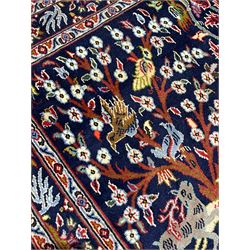Small Persian garden rug, the field decorated with animals and birds in tree landscape, the border decorated with repeating plant motifs